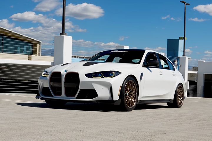 White BMW M3 parked outside